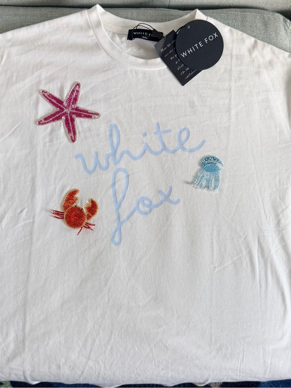 White Fox Boutique shirt red starfish, orange crab, blue jellyfish NWT S/M